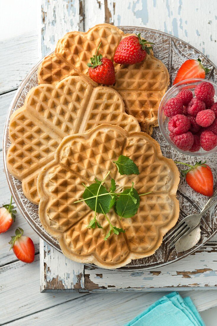 Vegan, gluten-free waffles with berries (seen from above)