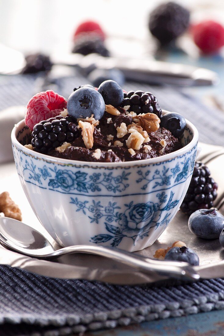 Chocolate mousse with walnuts and fresh berries