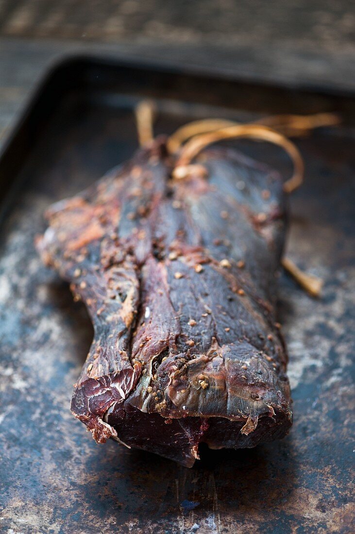 Dried beef on a baking tray