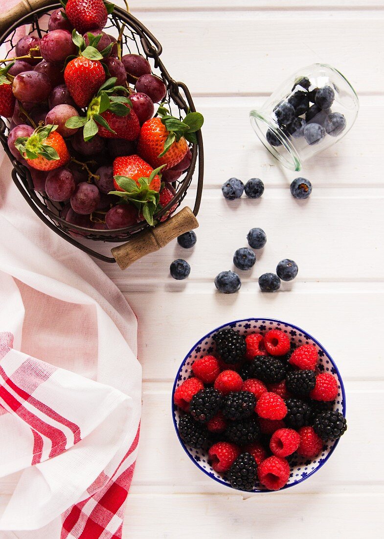 An arrangement of fresh berries and grapes