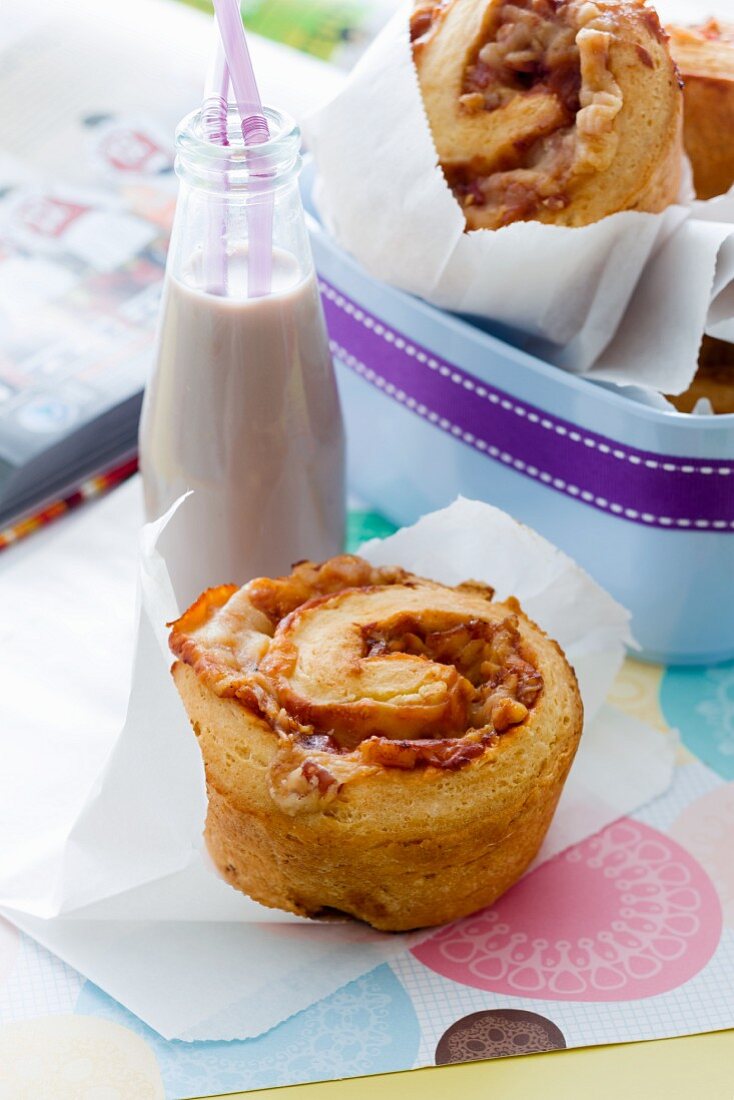 A cheese and bacon bun and a chocolate shake