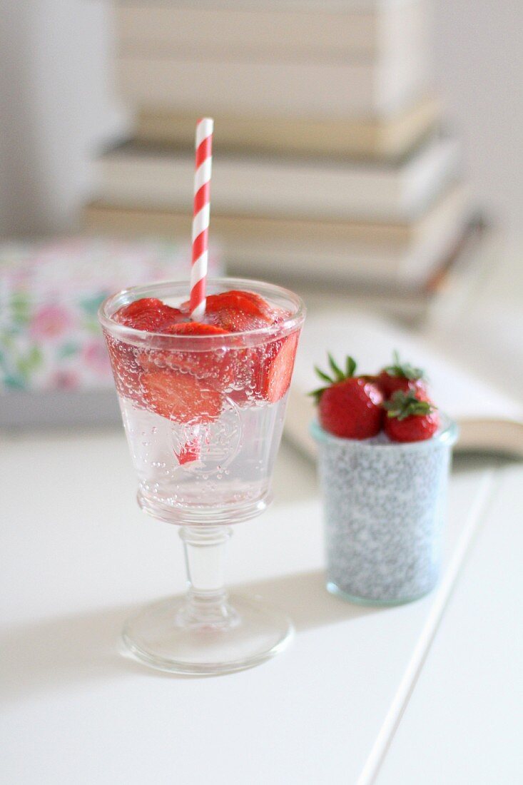 Infused water: water flavoured with fresh strawberries