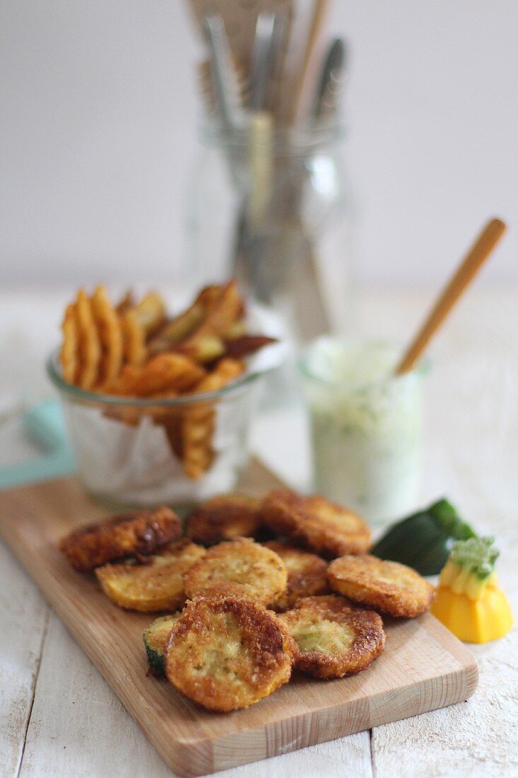 Breaded courgette fritters with a dip