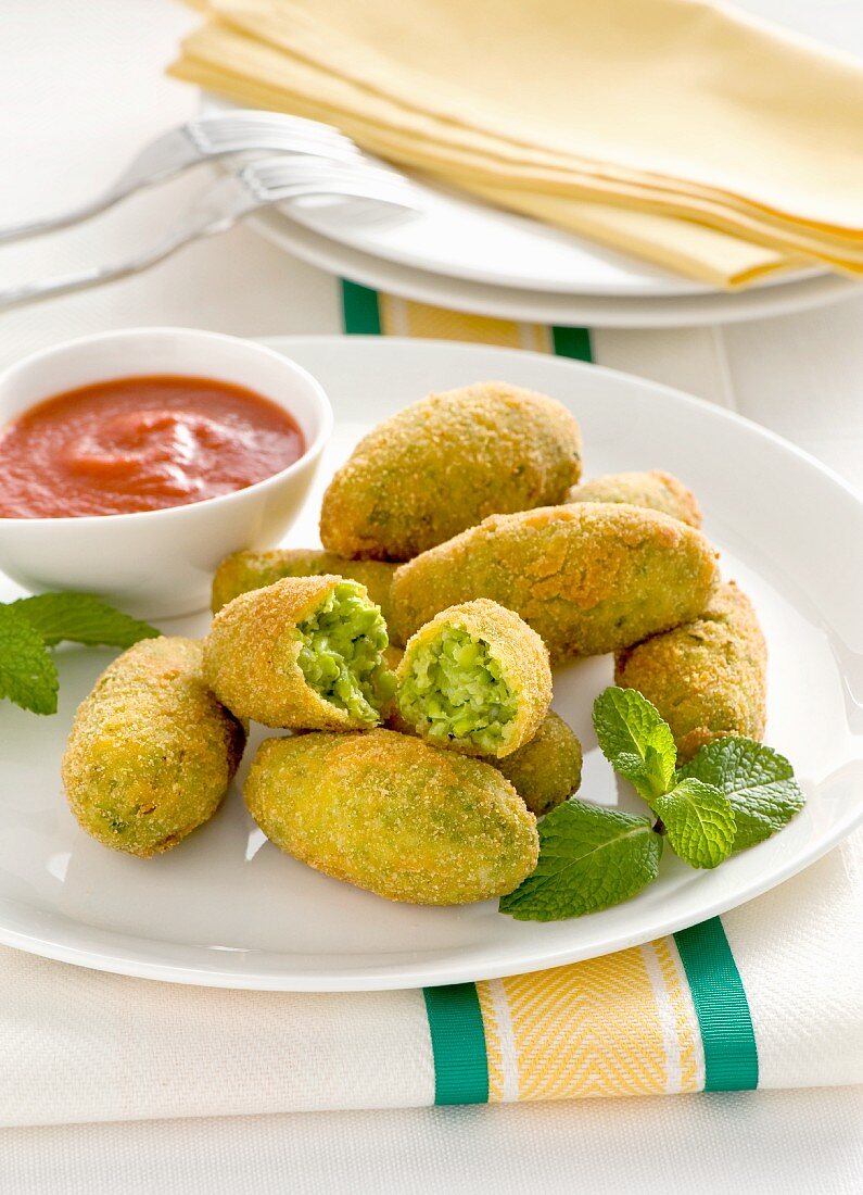 Pea croquettes with a tomato dip