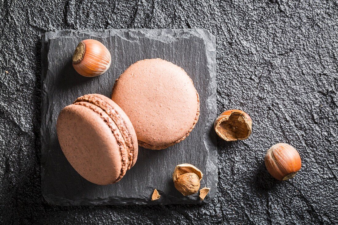 Hazelnut macaroons on a black stone