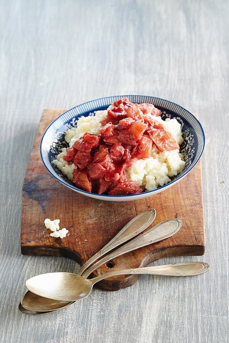 Bowl of Rice Pudding Topped with Rhubarb