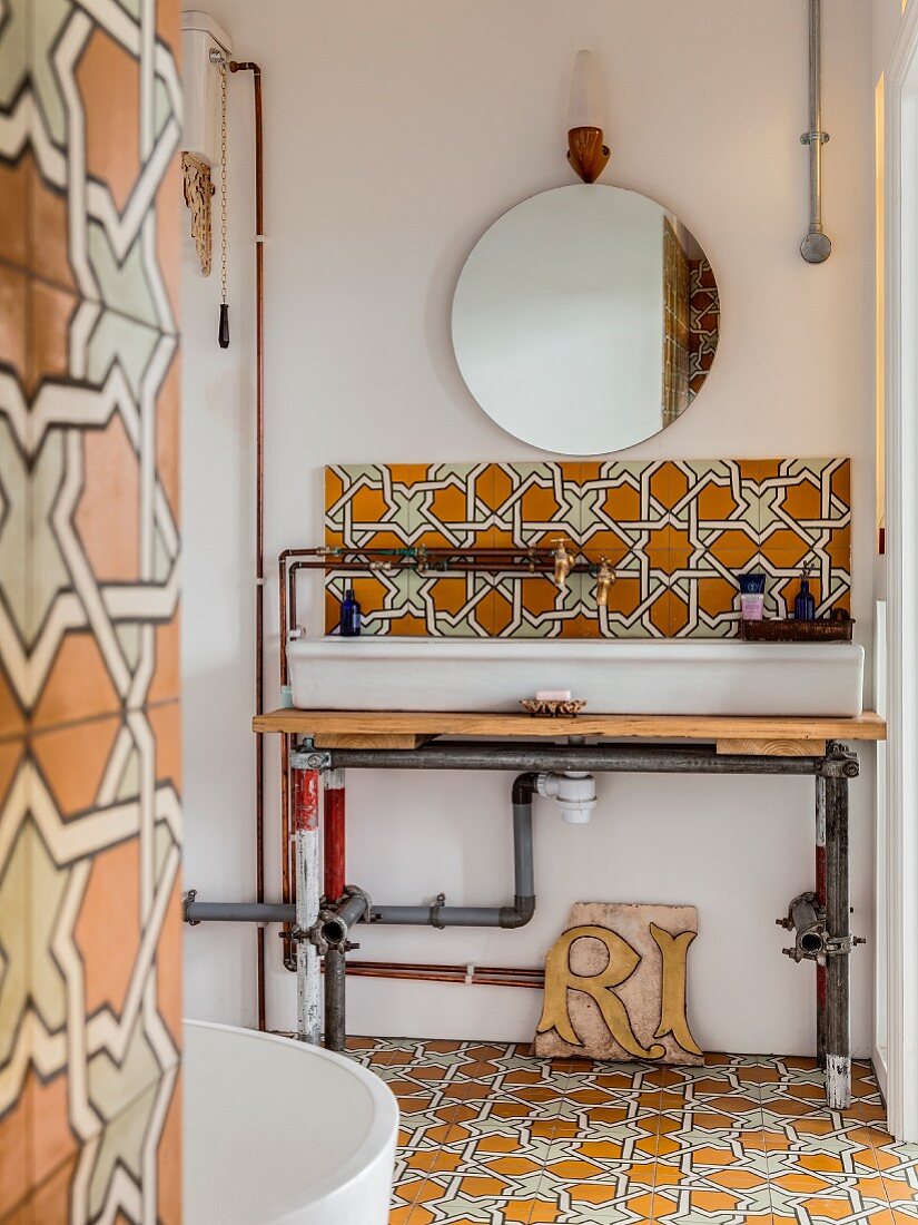 Vintage-style washstand with DIY top and exposed piping