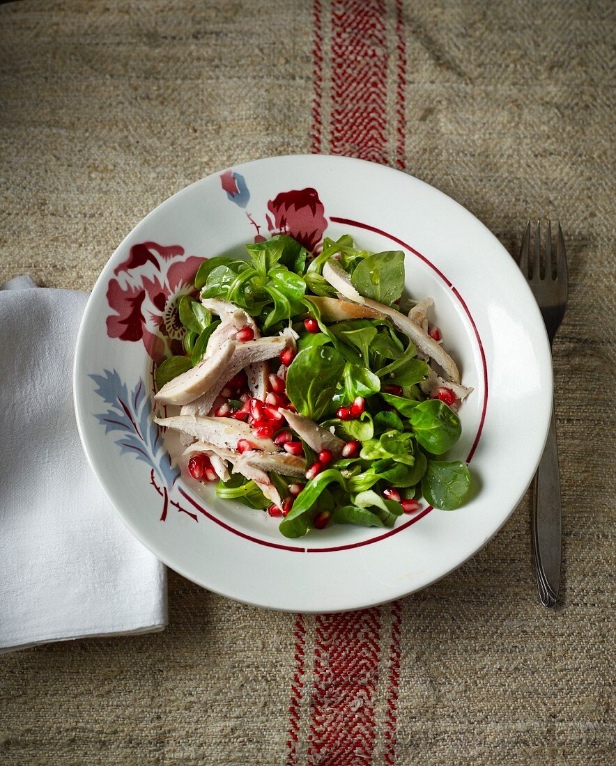 Kaninchenkeulen mit Feldsalat und Granatapfel