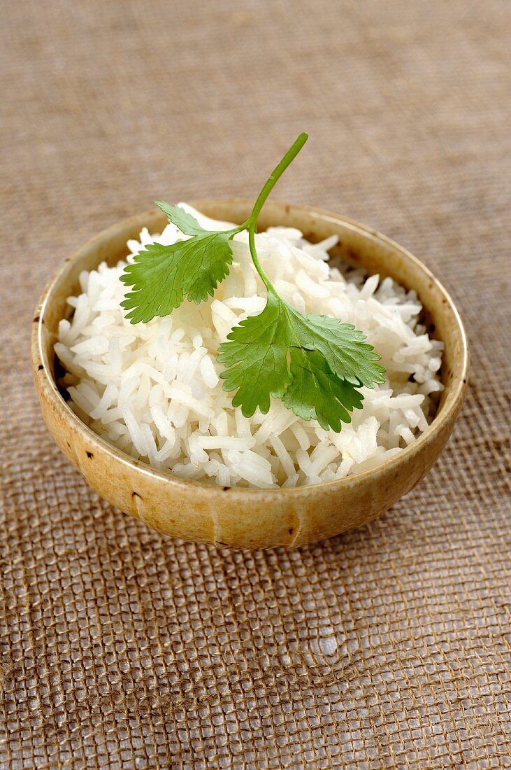 Basmati rice and fresh coriander leaves