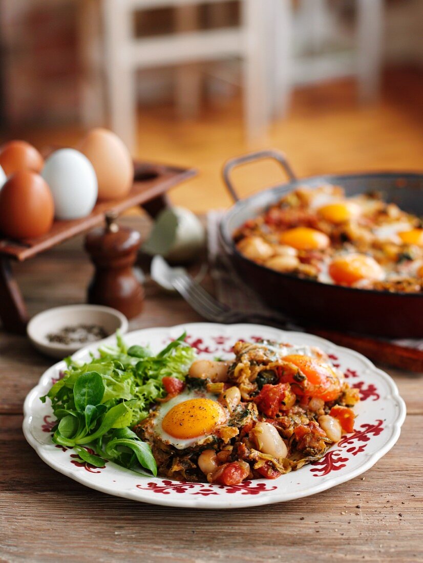 Ratatouille with courgettes, butter beans and fried egg