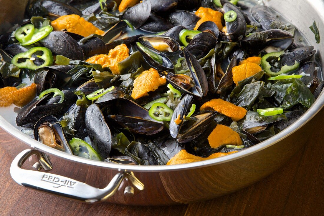 Mussel soup with sea urchins and seaweed