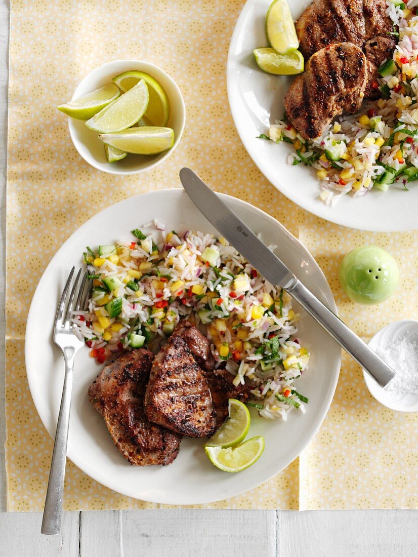 Grilled lamb steaks with vegetable rice