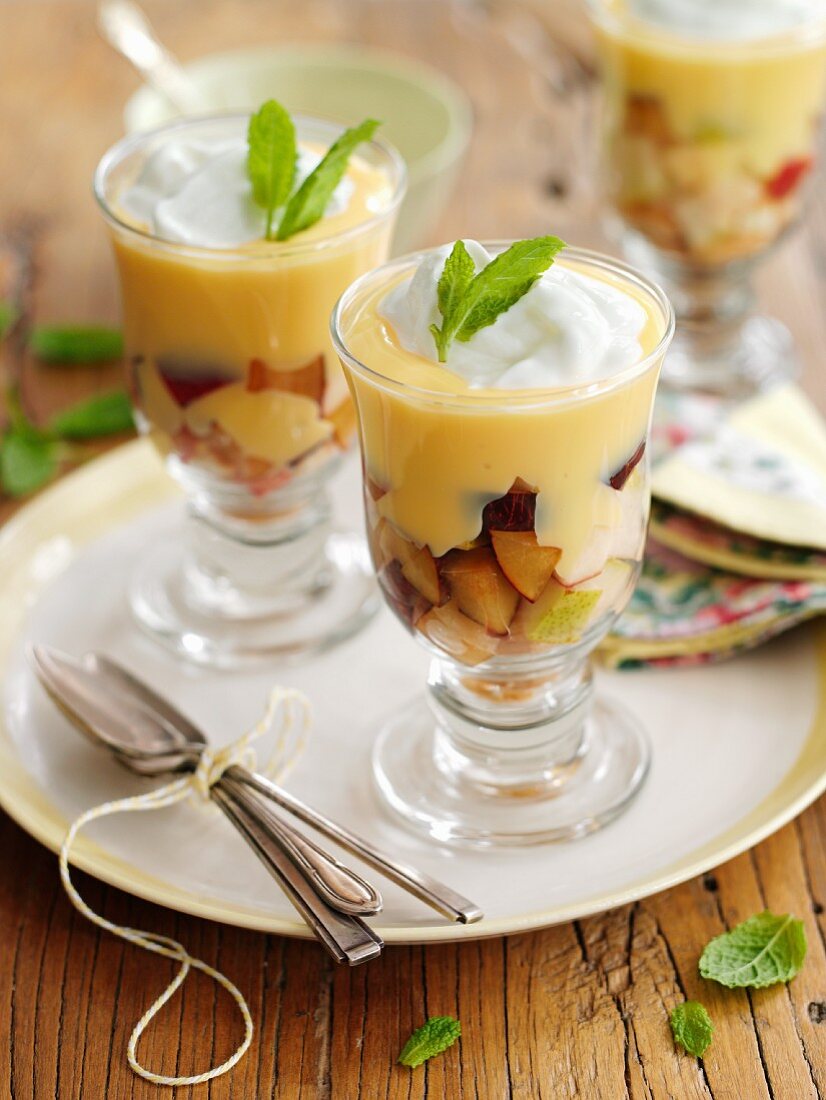 Trifle with fruit, cream and mint