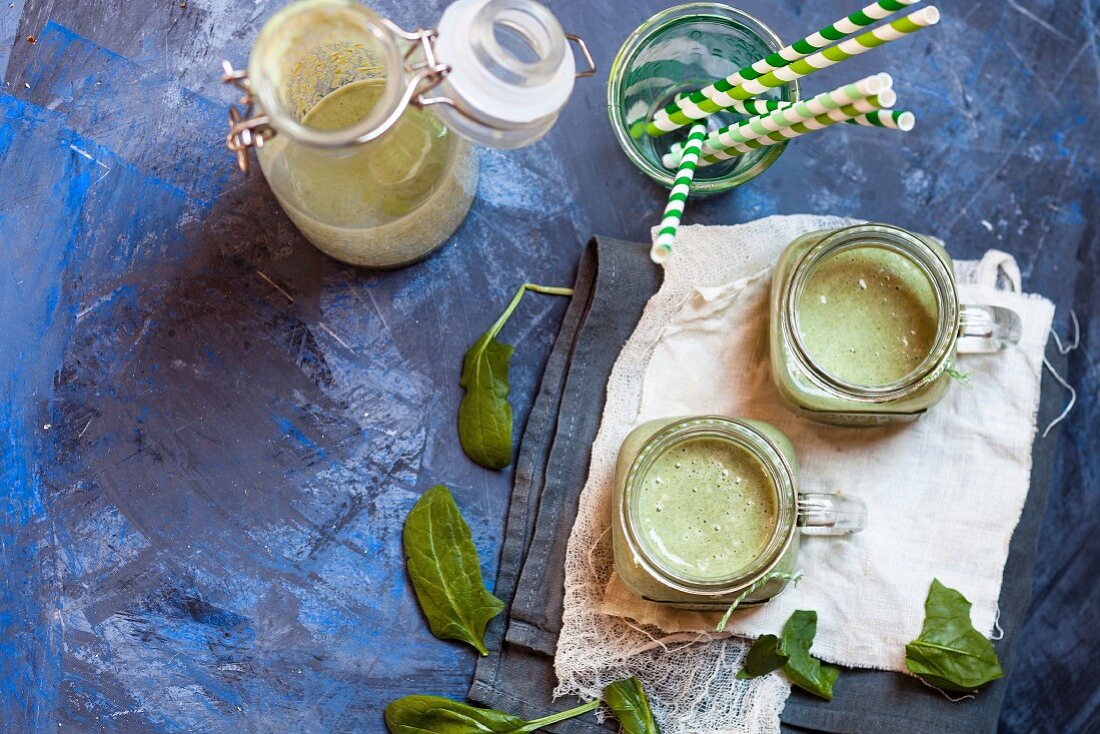 Green smoothies made with bananas, yoghurt and spinach