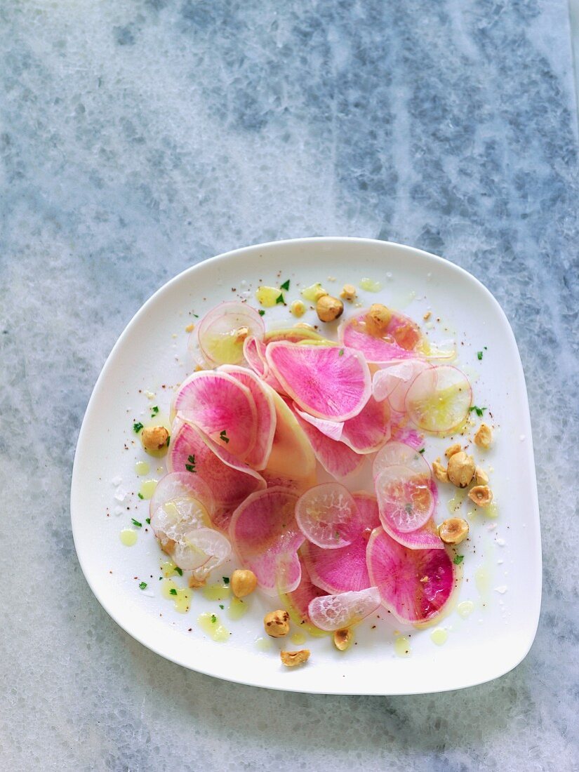 Watermelon radish and hazelnut salad