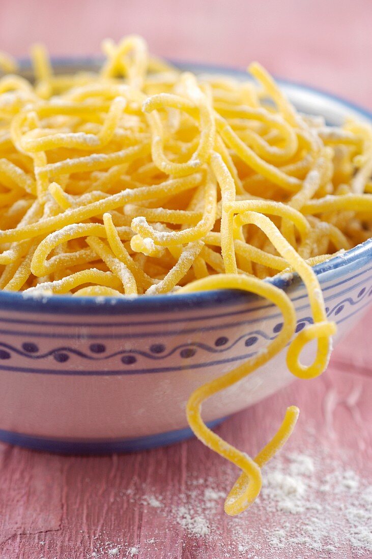 Bigoli in a ceramic bowl