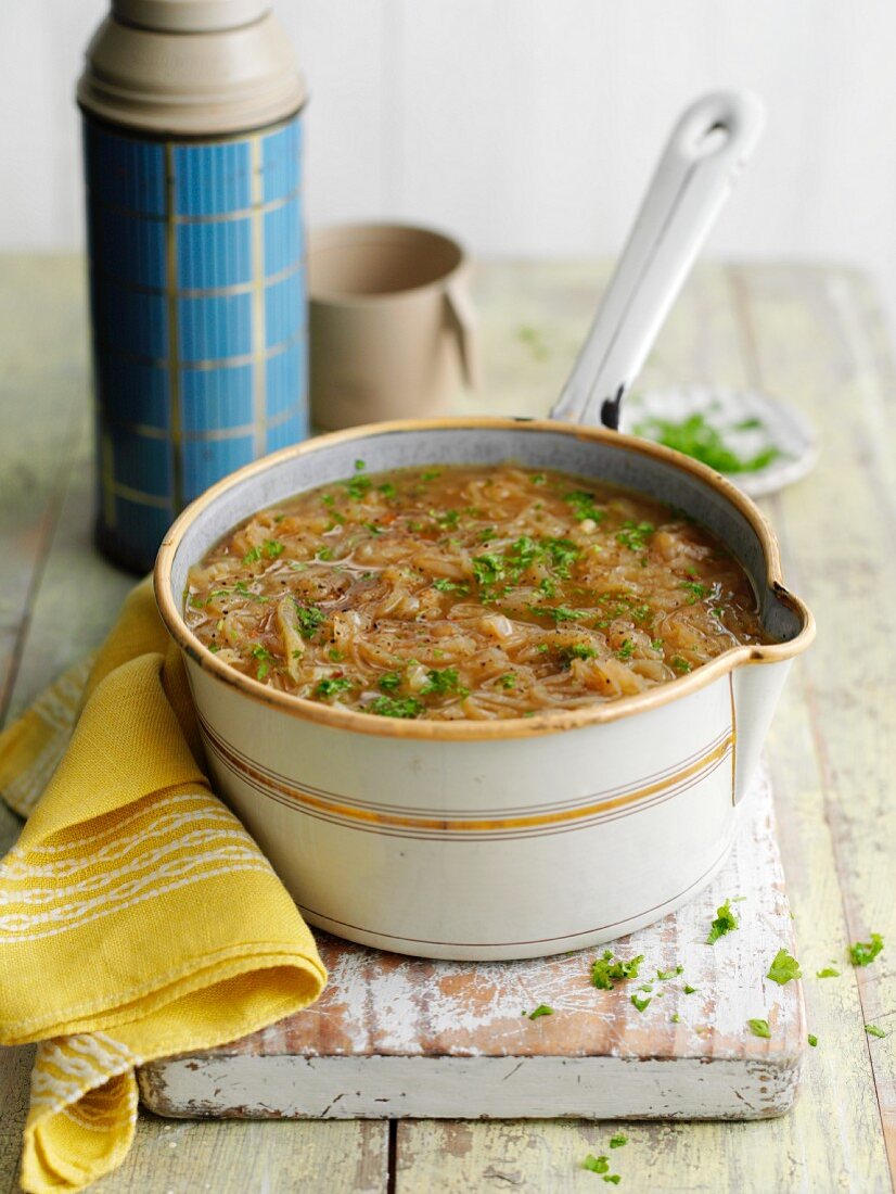 Caramelised onion soup in a saucepan