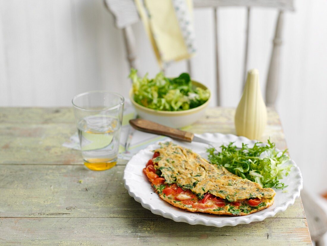 Omelett mit Kirschtomaten und Kräutern