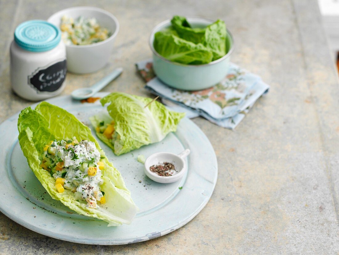 Lettuce wraps filled with chicken and mango relish