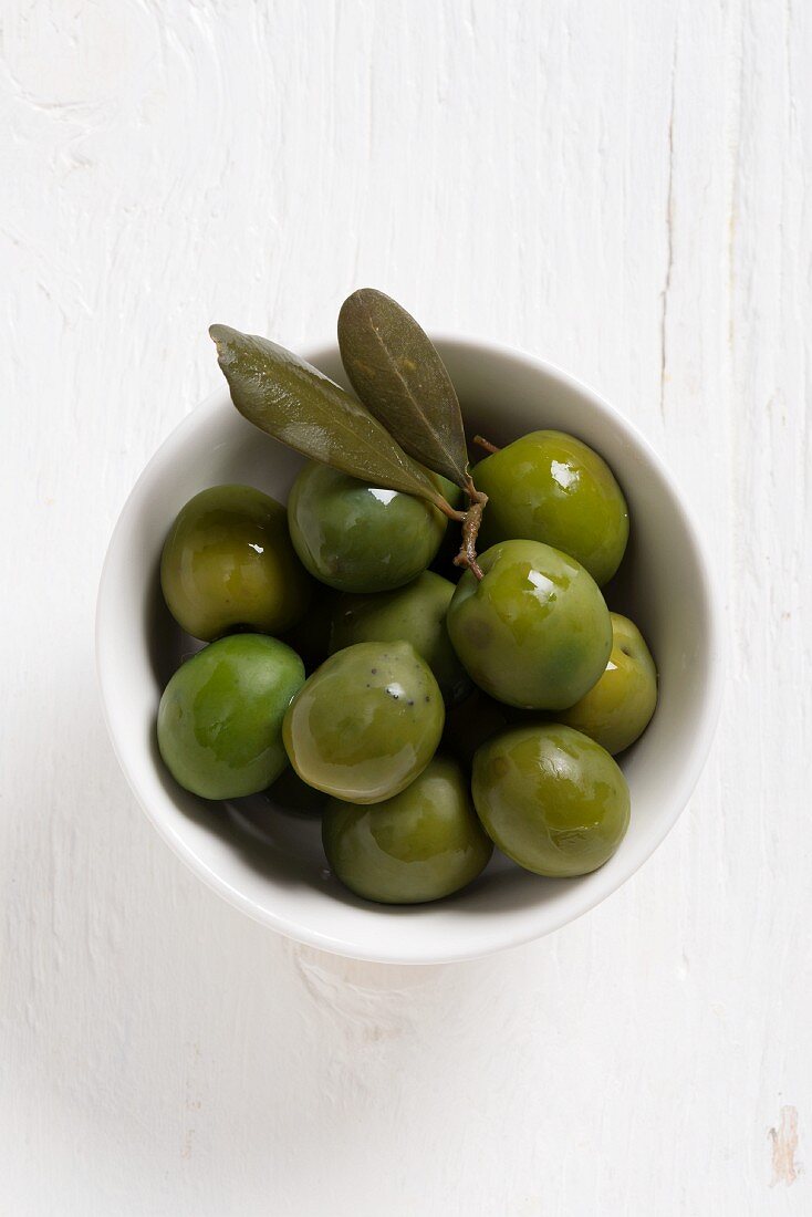 Dolce di Napoli olives in a white bowl