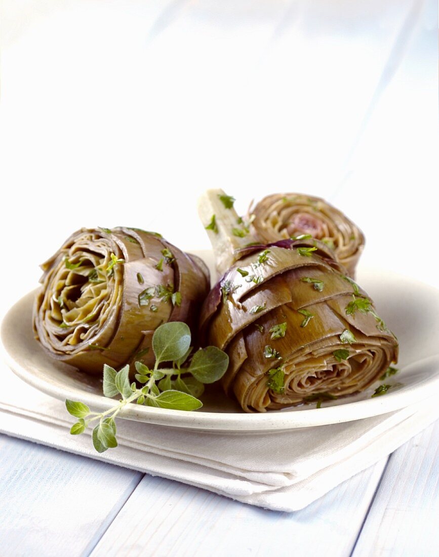 Carciofi alla romana (artichokes with fresh herbs, Italy)