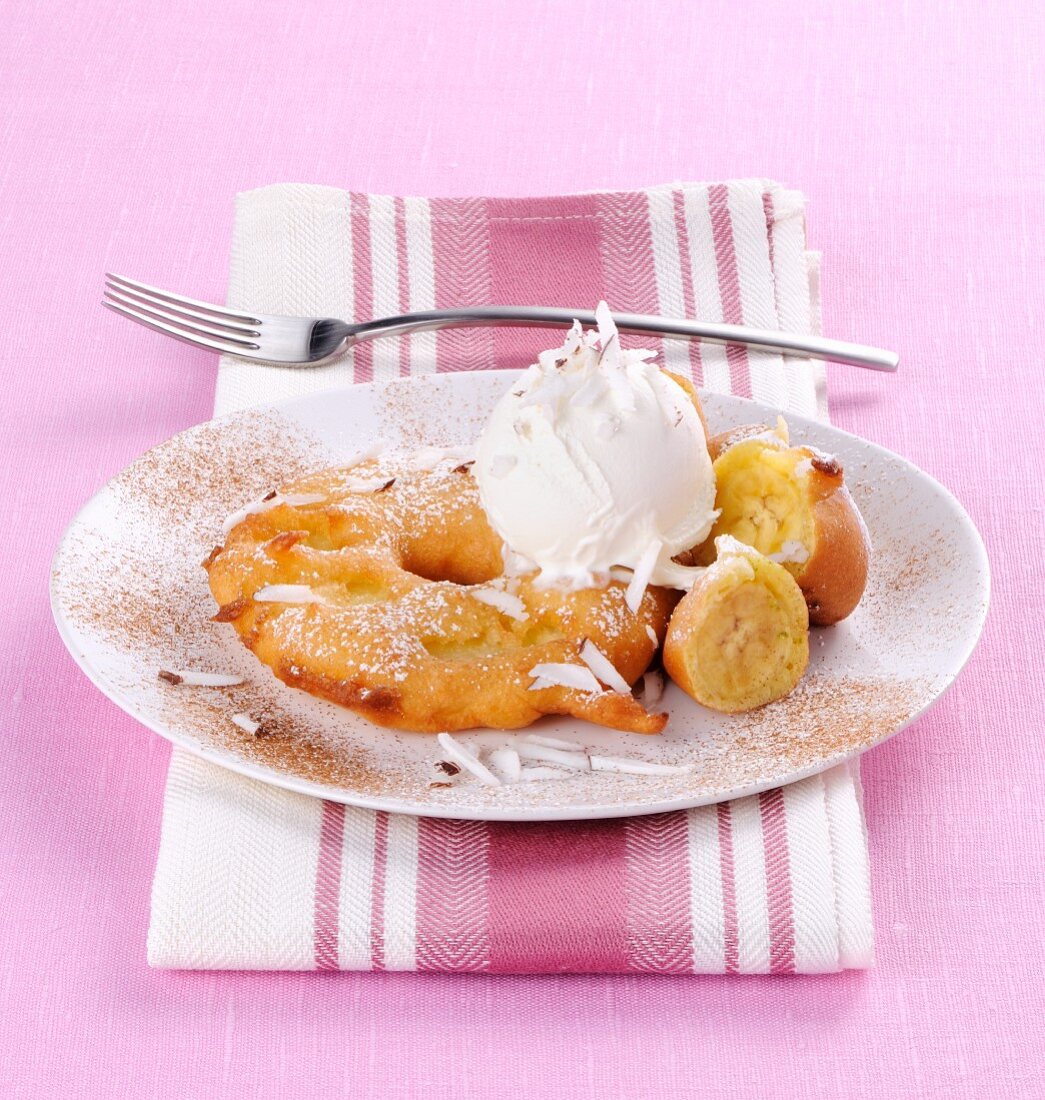 Pineapple and banana cakes with coconut ice cream