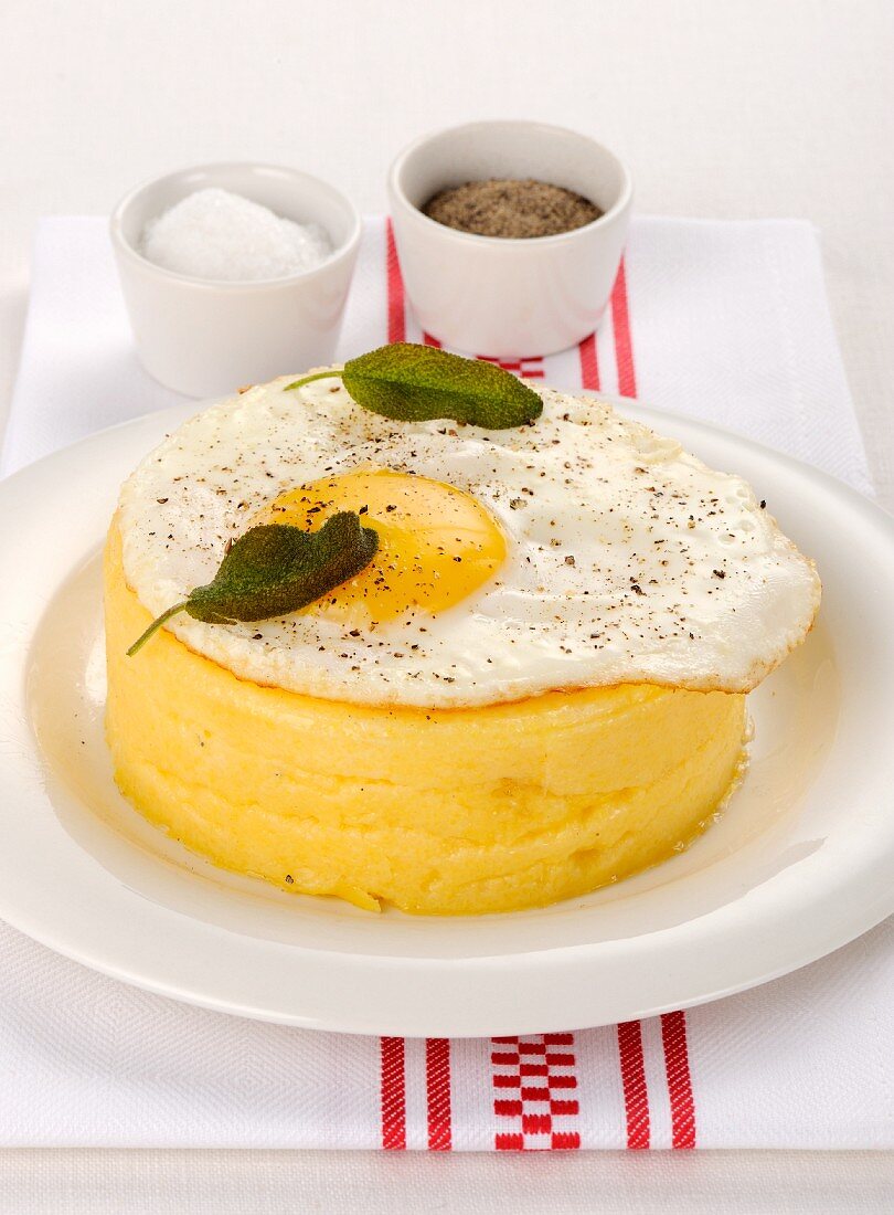 Polenta tartlet with fried egg and sage