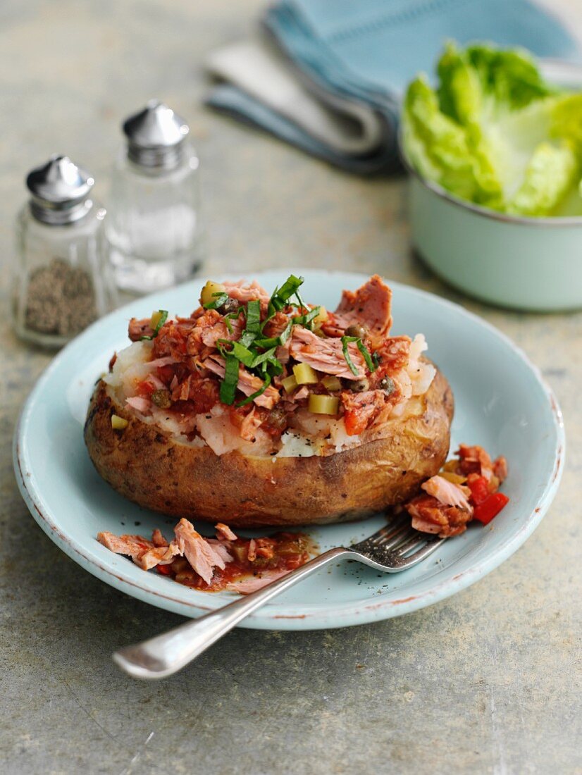 A jacket potato filled with tuna fish and pepper