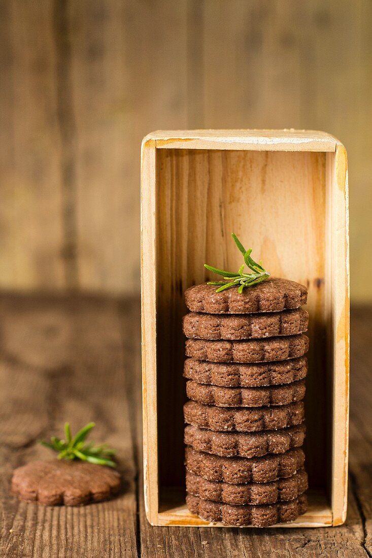 Chocolate biscuits stacked in a wooden box