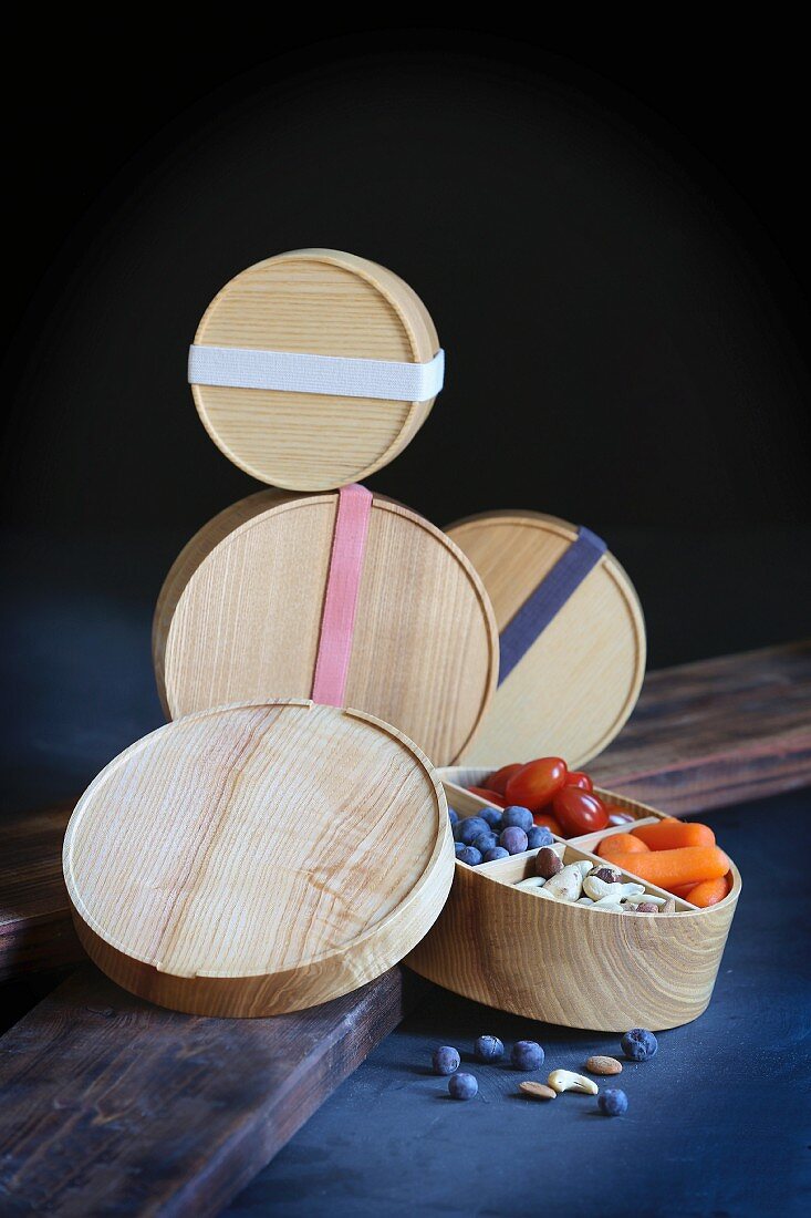 Round wooden food storage boxes