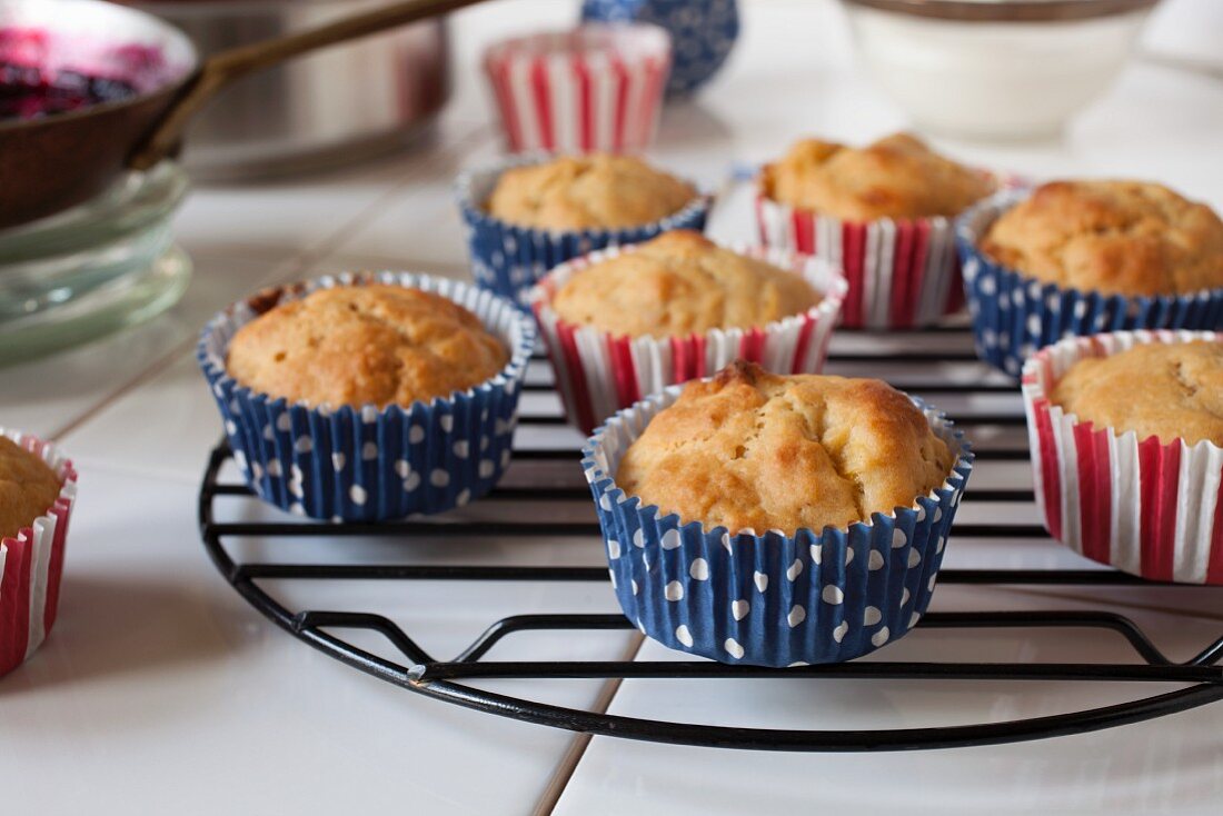 Cupcakes for the French national holiday on a wire rack