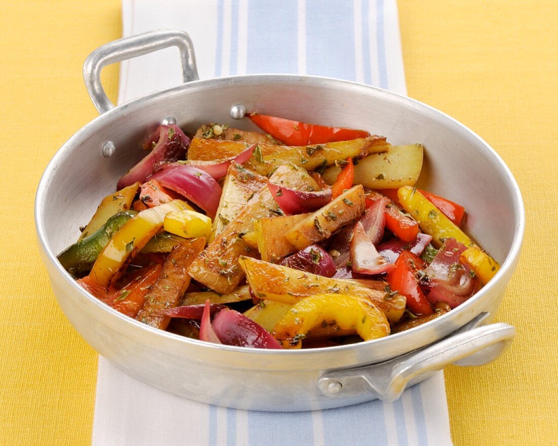 Colourful fried vegetables with oregano