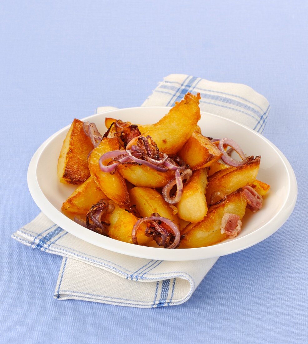 Smoked and fried potatoes with onion