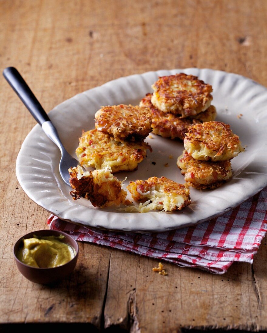 Cabbage fritters with bacon and mustard