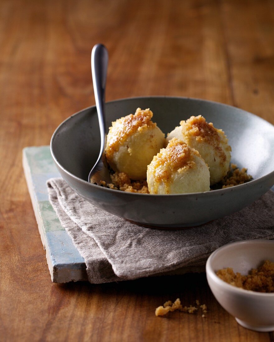 Quark dumplings with buttered crumbs