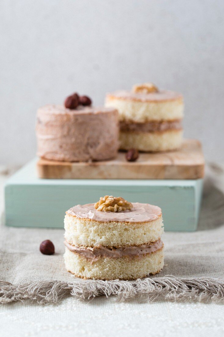 Sponge cakes with a cream filling, walnuts and hazelnuts