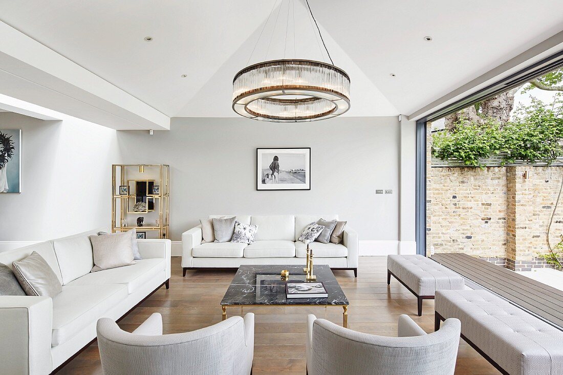 Elegant living room with glass wall