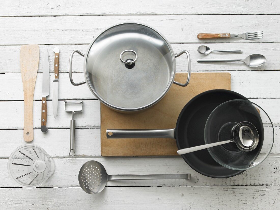 Kitchen utensils form preparing omelettes and asparagus