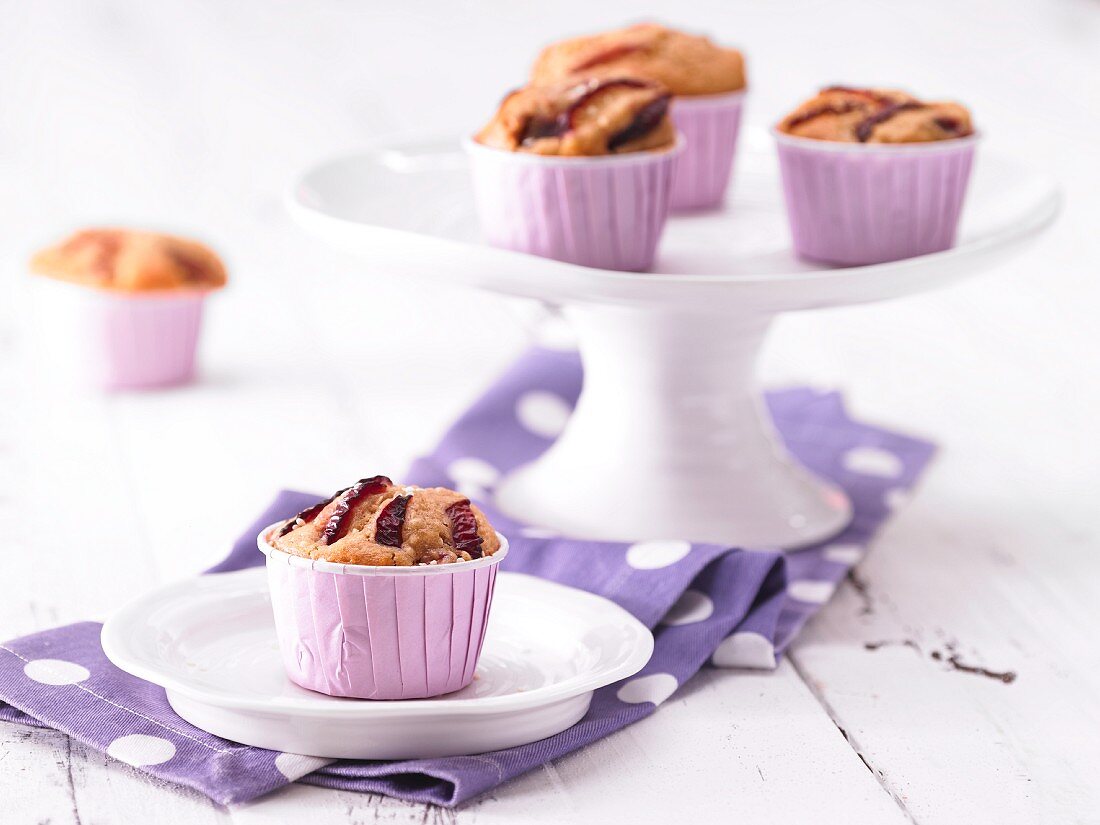 Plum muffins with sesame seeds
