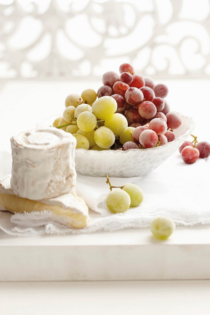 Frozen grapes and cheese board