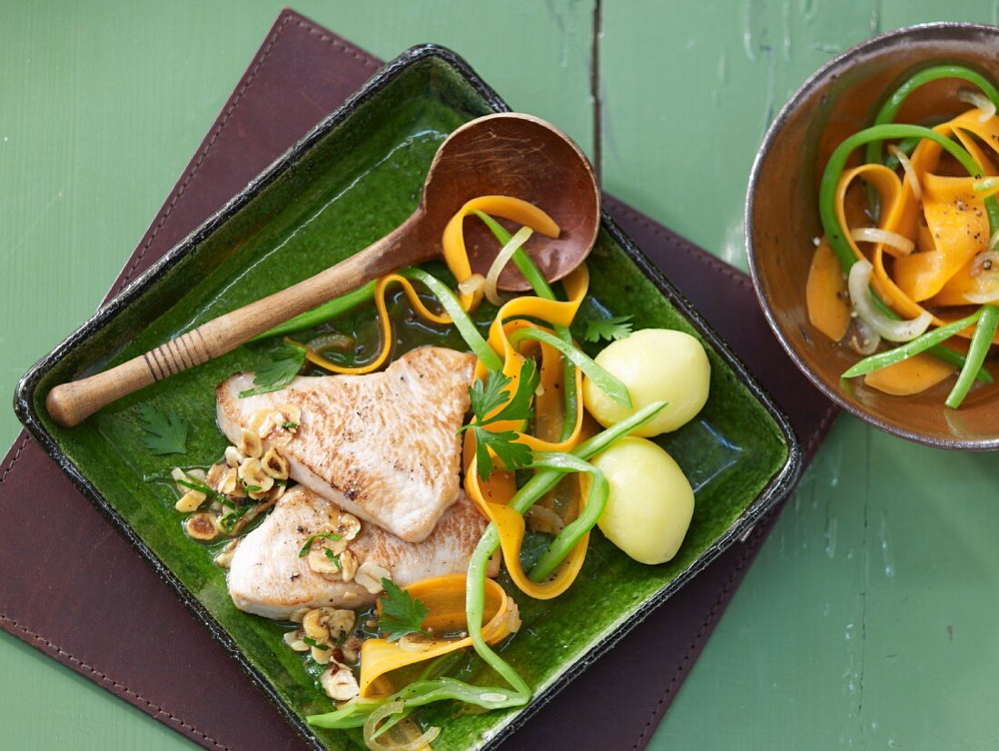 Turkey escalopes with a colourful bean and carrot medley