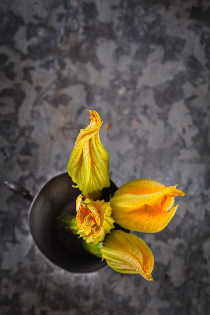 Courgette flowers in a bowl