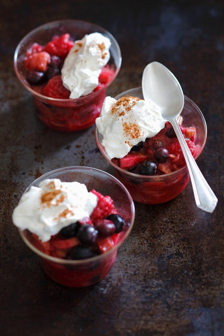 Rhubarb and berry compote with cream and cinnamon
