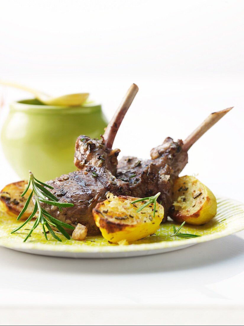 Marinated lamb chops with lemon potatoes from a barbecue