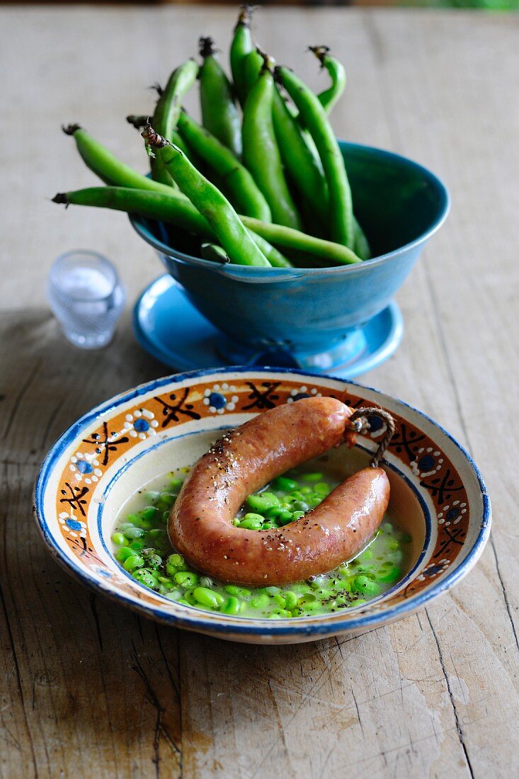 Broad bean soup with sausage