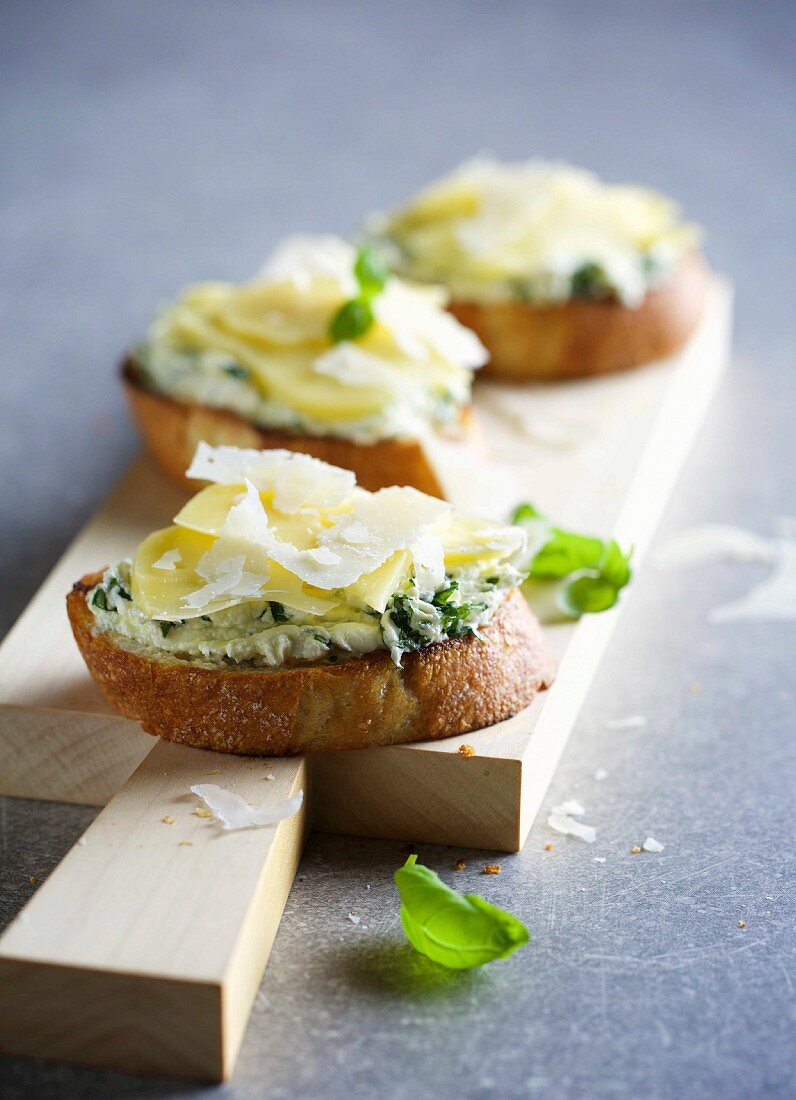 Baguette slices topped with three types of cheese