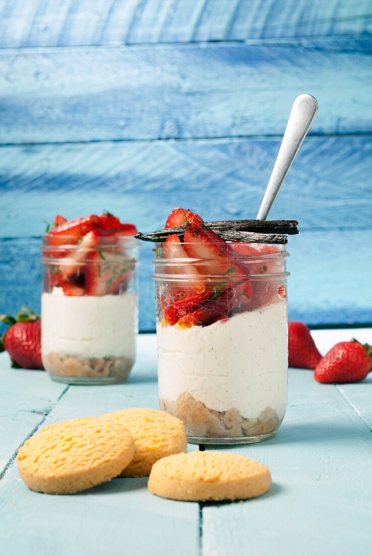 Summer layered deserts with shortbread, ricotta and strawberries