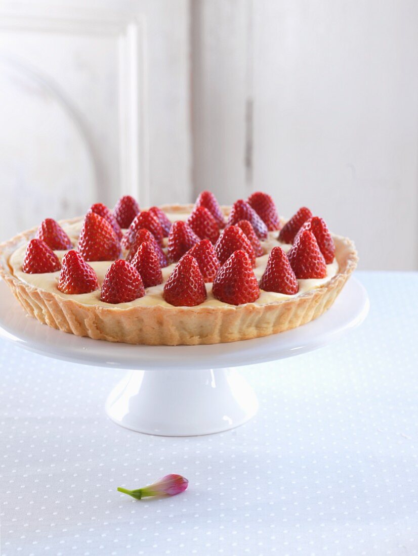 A strawberry tart with vanilla cream