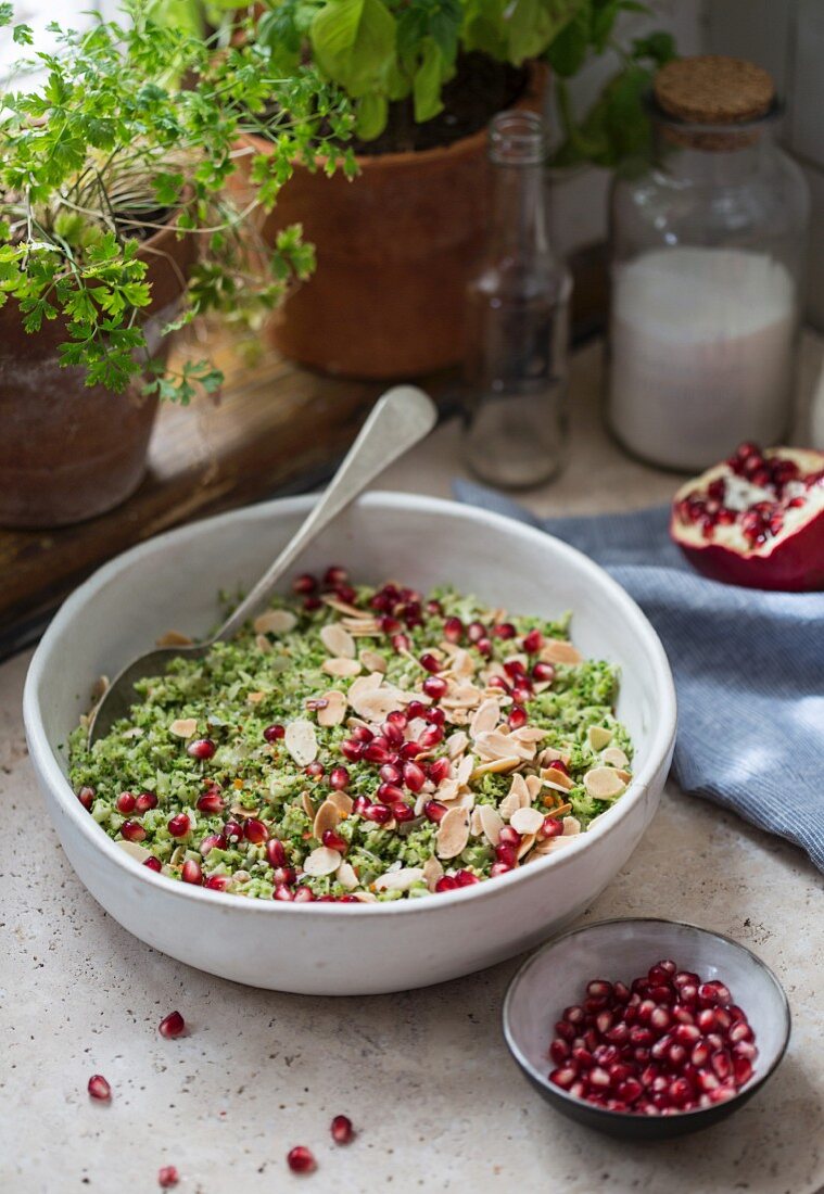 Broccoli salad with pomegranate seeds and almonds