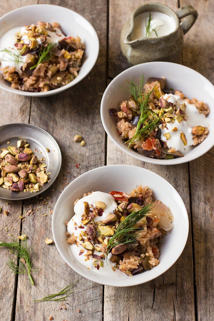 Aubergine pilau with yoghurt, dill and pistachio nuts